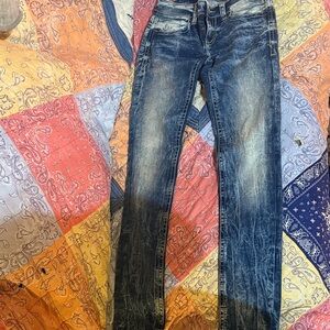 Buckle Women’s Distressed Blue Jeans